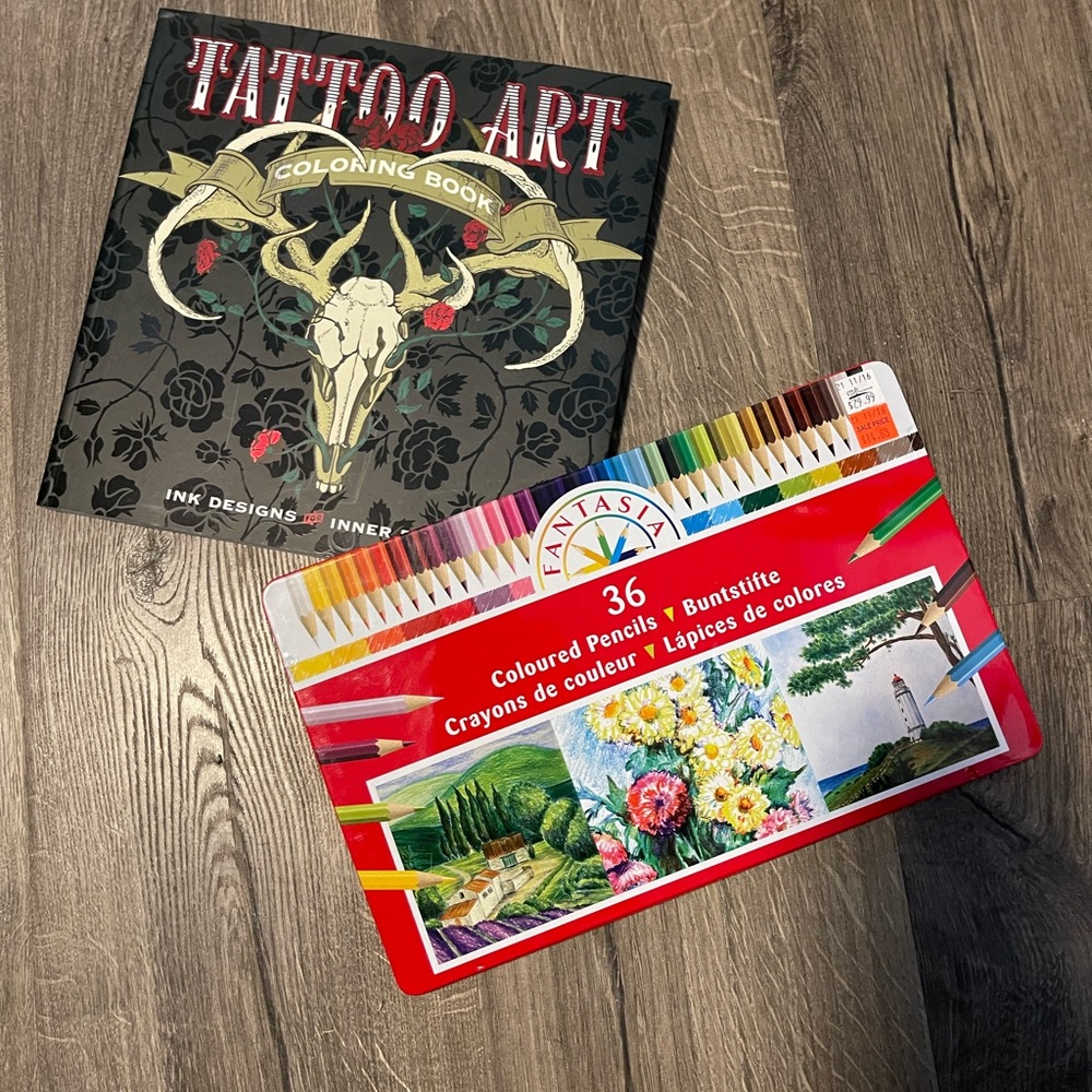Tattoo coloring book and pencils